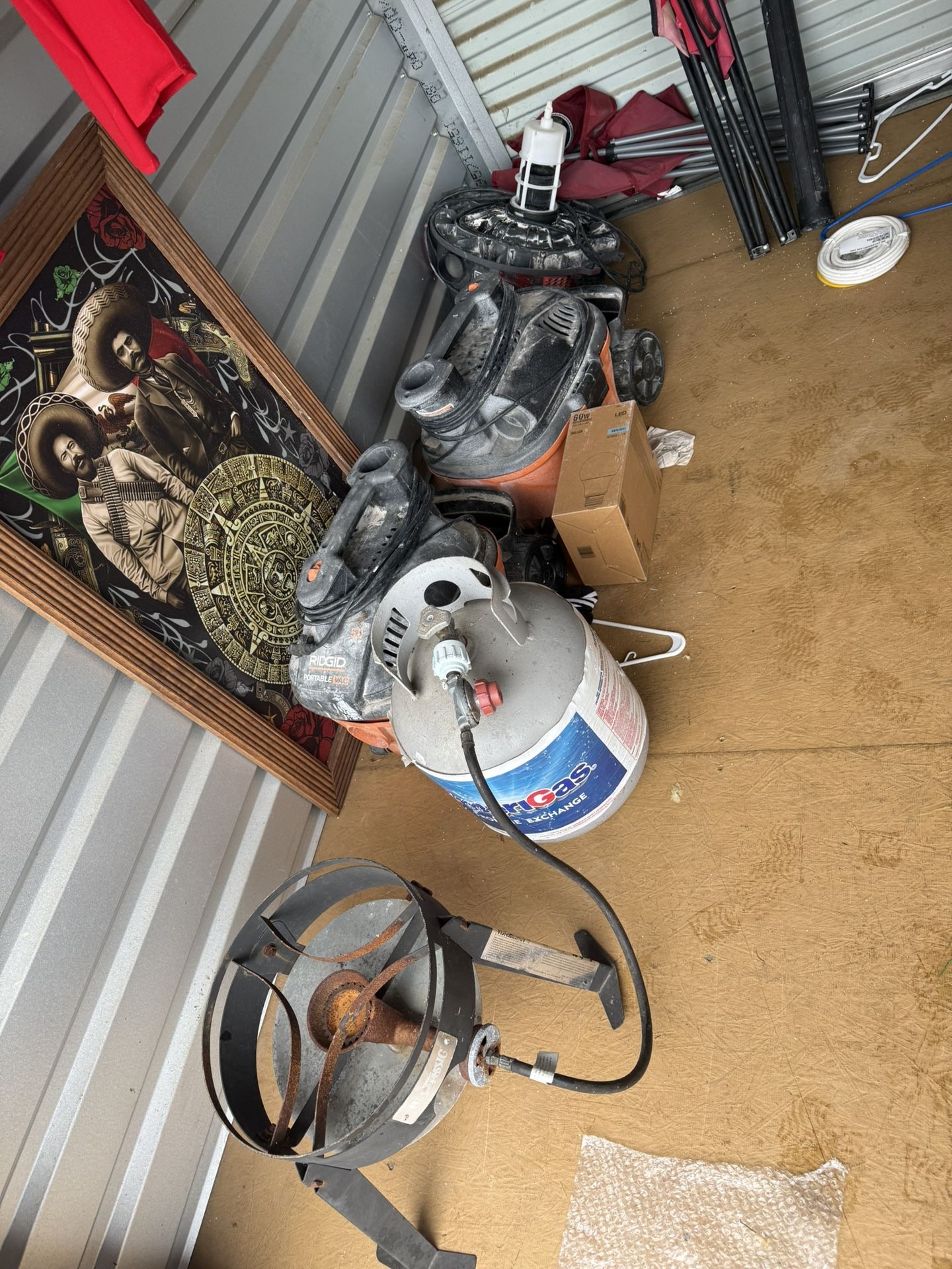 Two Ridgid Portable Vac And Gas Tank With Out Door Burner