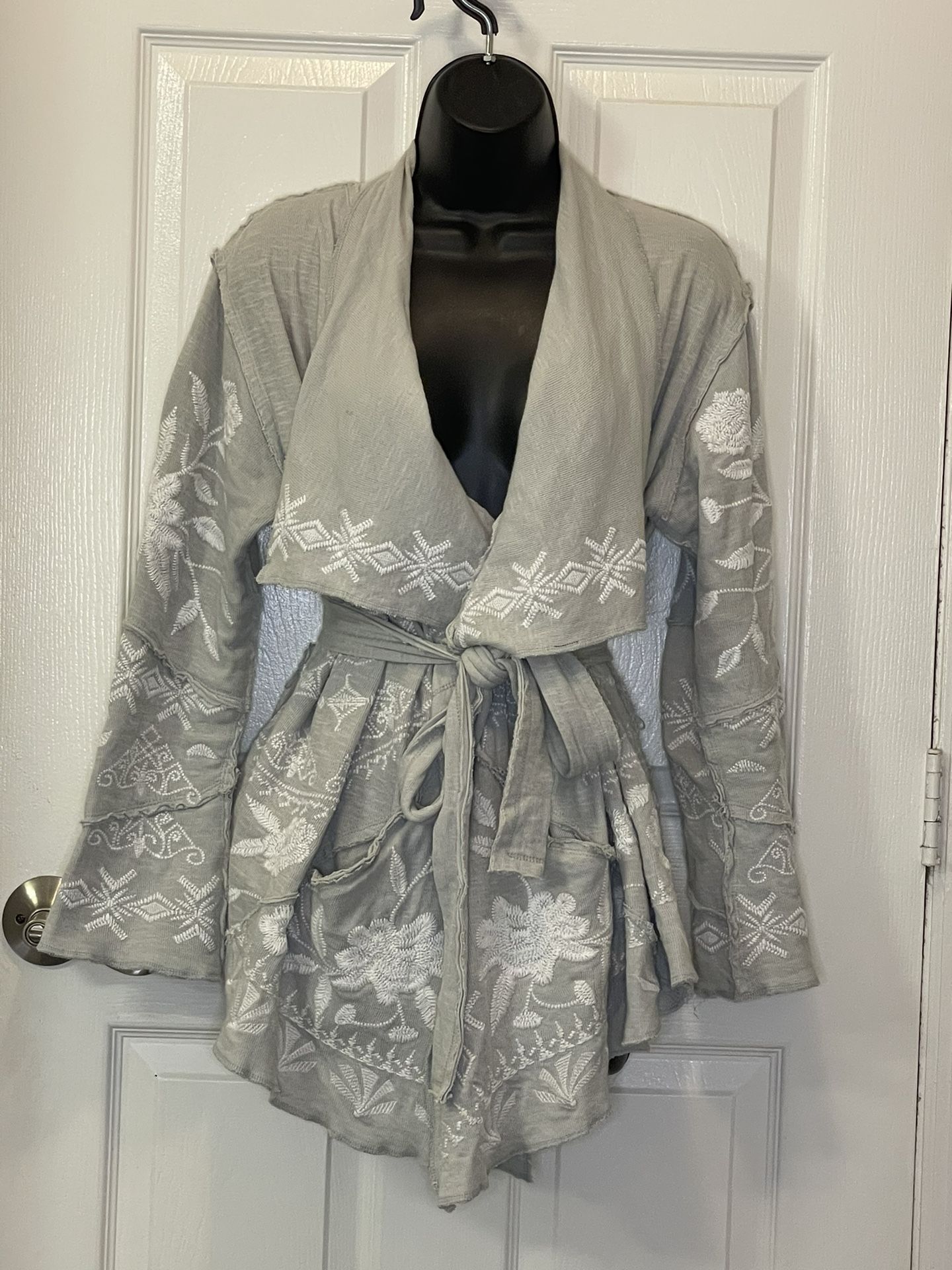 Caite brand jacket with vintage inspired embroidery.