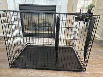 1 Large Dog Crate . 42 in L x 28 ½ in W x 32 in H with 1 ¼ in wire spacing
