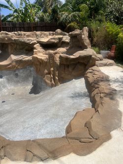 Pool rock acid drain