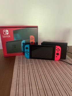 Nintendo switch w/neon blue and red joy con