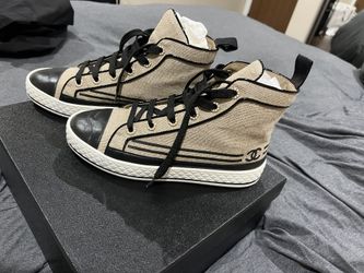 Chanel Pharrell Canvas High Top Sneakers