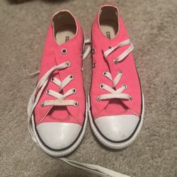 Bright pink Converse