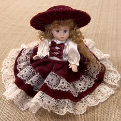 German Porcelain Doll with Velvet Burgundy Dress & Hat 
