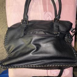 Black leather shoulder bag with chain detail 
