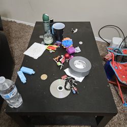 Needs To Fast,Nice Coffee Table, I Know The Picture Has Stuff On It But It Is A Nice Coffee Table And I Apologize For The Picture With Stuff On It Lol