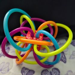 Manhattan Toy Winkel Rattle & Sensory Teether Toy, Blue/Green/Orange, 5 Inch x 4 Inch x 3.5 Inch
