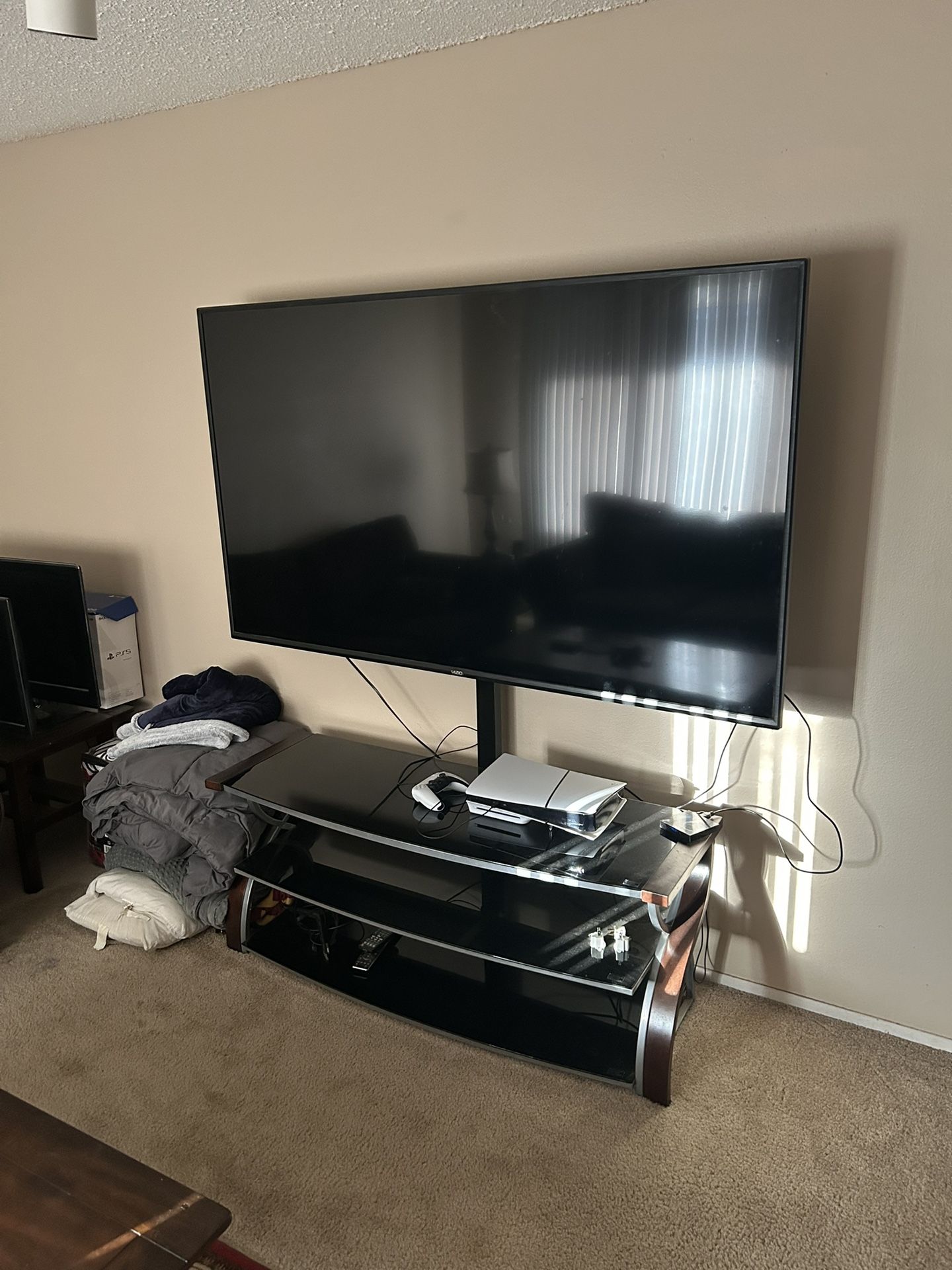 Black TV Stand with Glass Shelves – Modern and Sturdy!