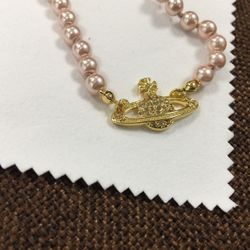Vivienne Westwood Mini Bas Relief Choker in Gold