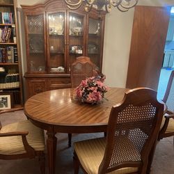 Solid wood antique dining room, table, chairs, and hutch set