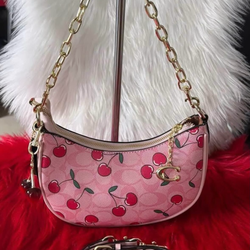 Cherry printed teri coach purse