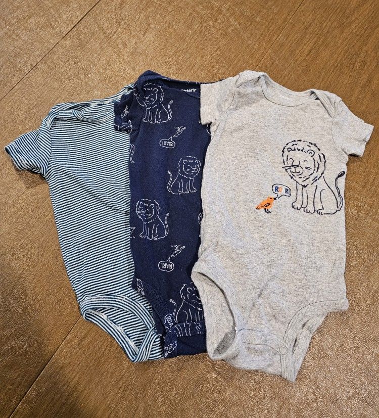 Set Of 3-Carters Size 12 Months One Piece. 2 Lion Themed, One Striped