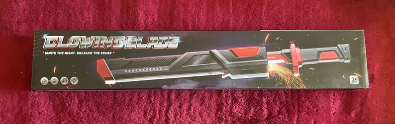 Glowing Blade toy sword, featuring red and black color styling