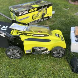 LAWN MOWER.  RYOBI  20-Inch 40-Volt Cordless Lawn Mower with Quiet Design