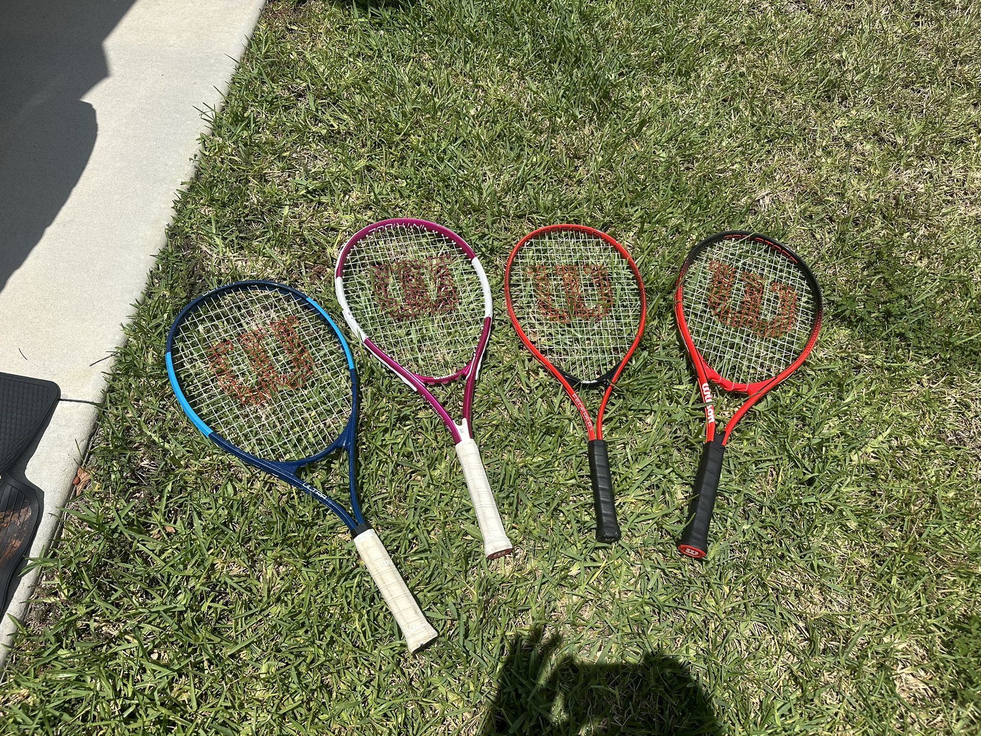 Set Of Four Wilson Tennis Racquets