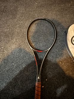 Black ace tennis racket
