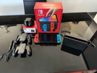 Nintendo Switch - OLED Model w/Neon Red & Neon Blue Joy-Con