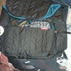 Diaper bag with changing station