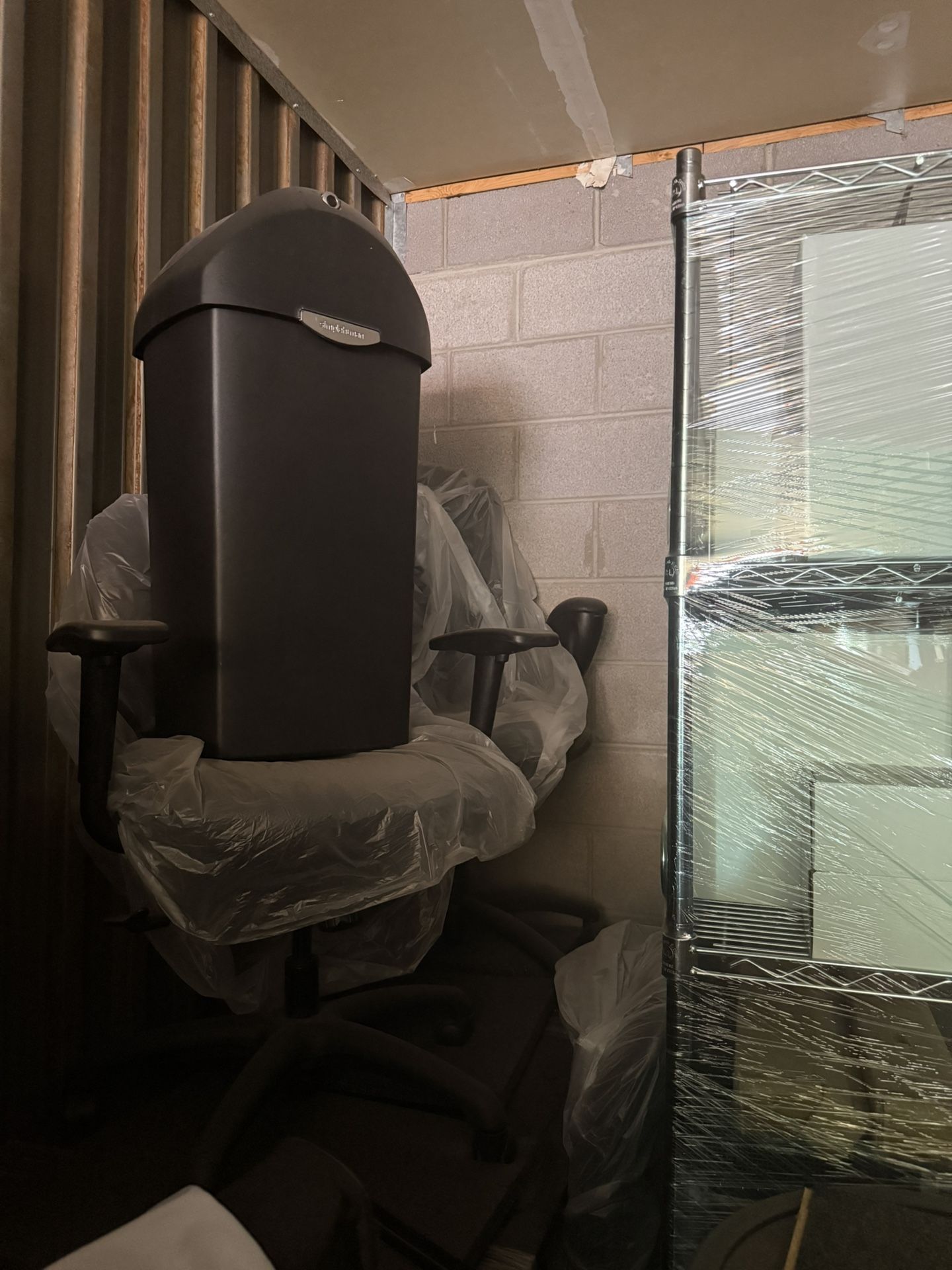 Office Chair And Big Trash Can