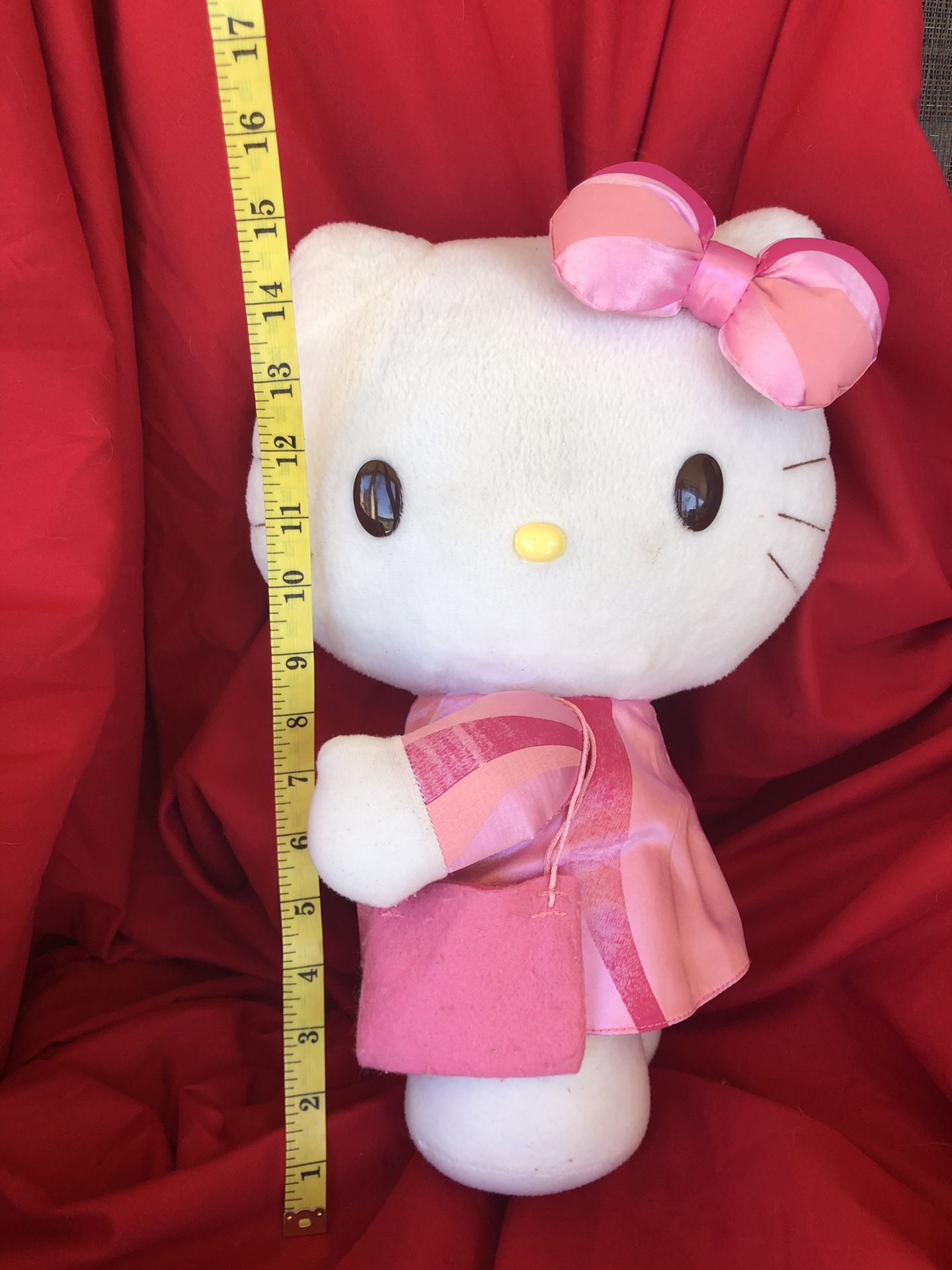 Large 15” Vintage Hello Kitty plush plushie doll , she’s holding a purse and has a pink dress and matching bow in hair. Toy sale! Sanrio