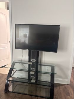 Tv with glass tv console