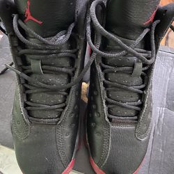 Black and red Jordan kids size 4Y