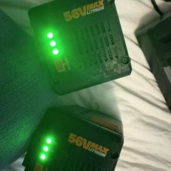 2 Batteries And A Charger 