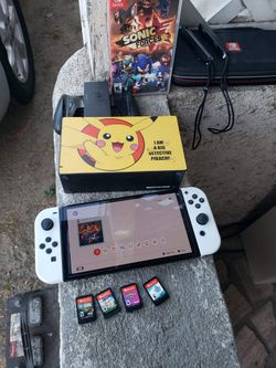 $220! New OLED 2024 Nintendo Switch white edition 128GB with case. Charger. Dock. & $20! Per Game. Trade up welcome