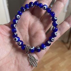 Evil Eye Bracelet And Variety Of Crystal Bracelets 