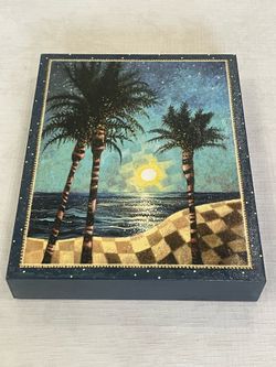 Decorative box with a tropical beach scene by artist Laura Seeley. 8” x 1.75”x 10”