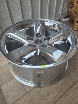 Dodge chrome rim  NEW - $150 (Downey)