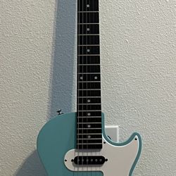 Turquoise Electric Guitar + Cord 
