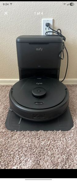 Eufy L50 Automatic vacuum cleaner with attached Auto bin