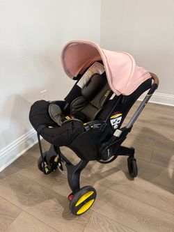 Doona Car seat & scroller + Base