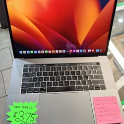 MacBook Pro 15" 2017 Retina TouchBar Intel Quad Core , 16GB Ram, Radeon Pro 555 2GB Graphics, macOS Ventura, Microsoft Office, Charger . 