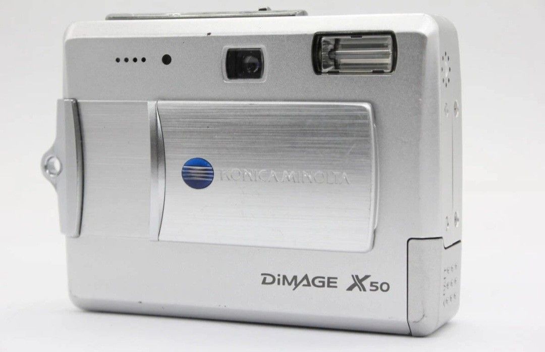 KONICA Minolta Dimage X50 Compact Digital Camera 12MP LVF FOR PARTS NOT WORKING SCREEN DAMAGE NO ACCESSORIES INCLUDED. Konica Minolta DiMAGE X50 digit