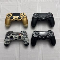 Four PS4 Controllers For Parts Or Repair (Not Working)