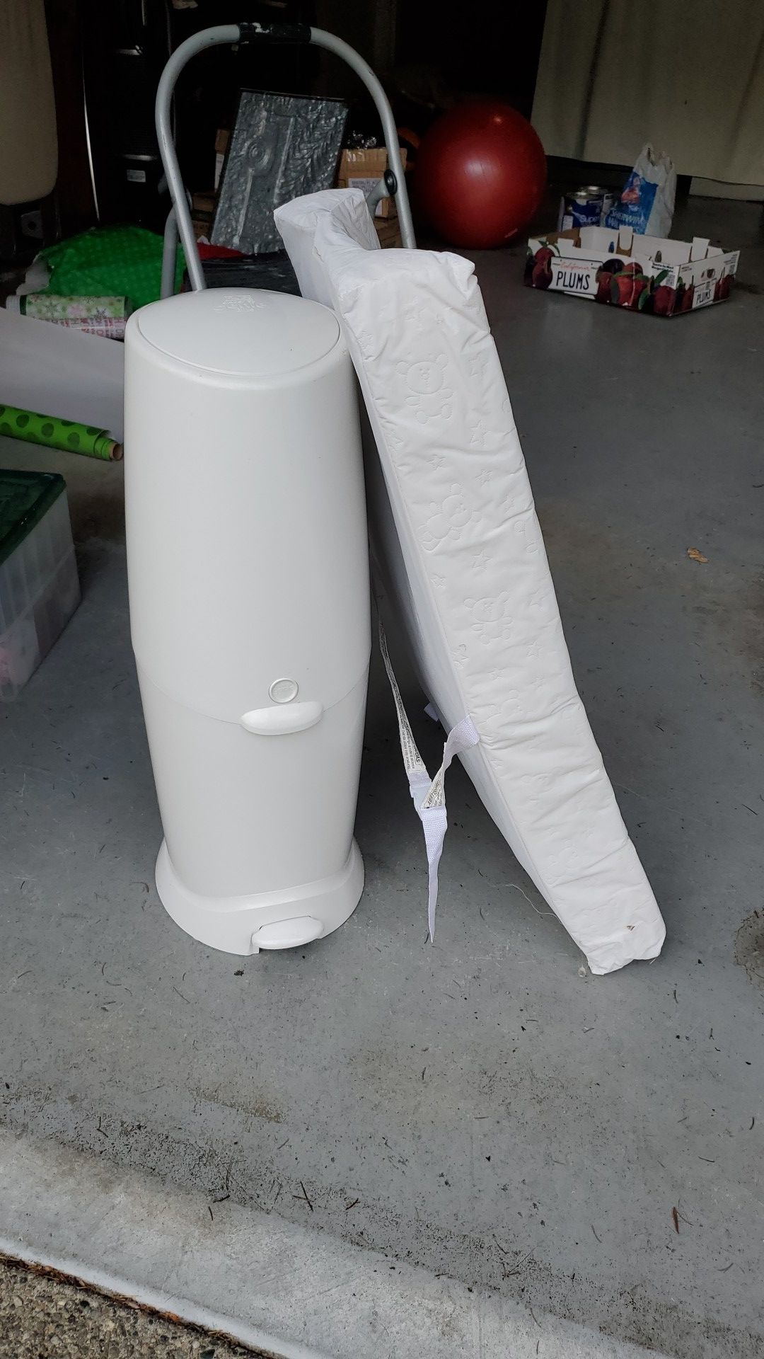 Diaper genie and changing pad