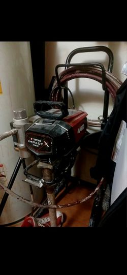 Titan impact 440 Paint Sprayer High Rider( Has Gun & Hose)