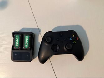 Xbox Controller with rechargeable battery pack and charger.