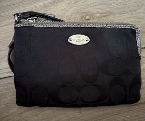 black Coach signature fabric corner zip wristlet