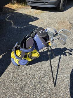 Kids Golf Clubs and Bag with a Couple Snoopy Clubs