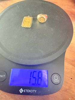gold ring and  gold bar pendant pendant