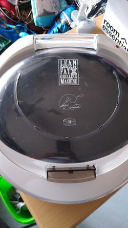 Lean mean fat grilling machine
