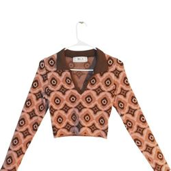 Size M/L  long-sleeved, collared crop top from the brand Rose Gold Avenue