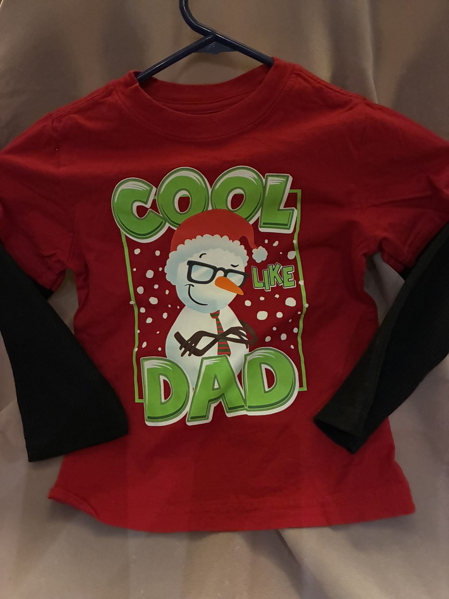 Red long-sleeve shirt with snowman graphic and 'Cool Like Dad' text. Holiday time size 4