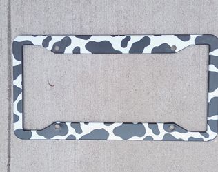 Cow license plate frame