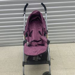 PURPLE EVENFLO BABY STROLLER