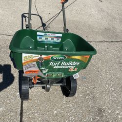 Turf Builder EdgeGuard DLX Broadcast Spreader