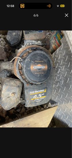 3 old lawnmower engines.